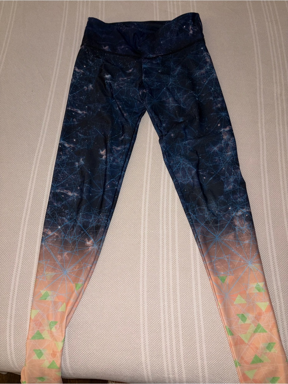 Onezie Women's XS Navy and Peach Geo-Print Leggings
